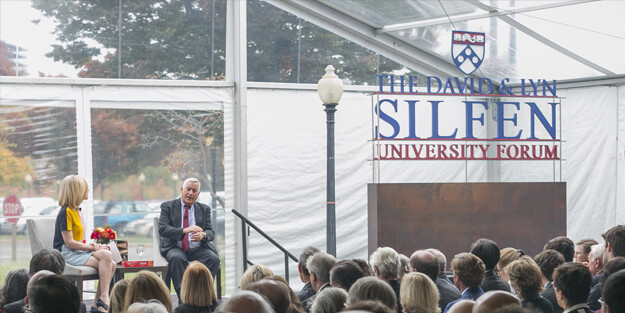silfen forum tent with amy gutmann and walter isaacson